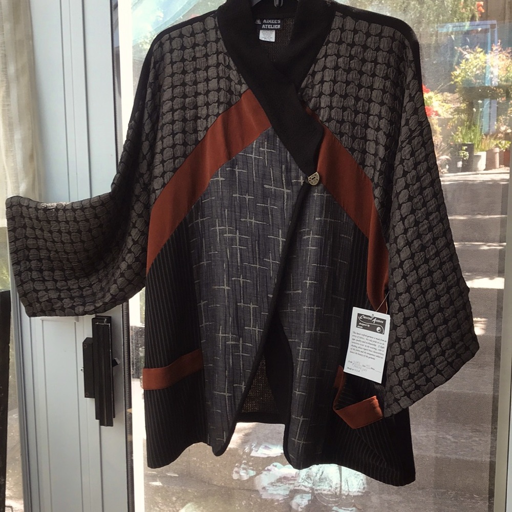 Crisscross Front Jacket With Combination Fabrics.